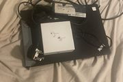 laptop and earbuds