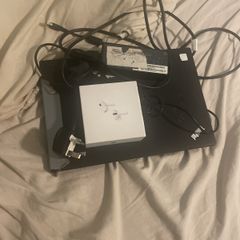 laptop and earbuds