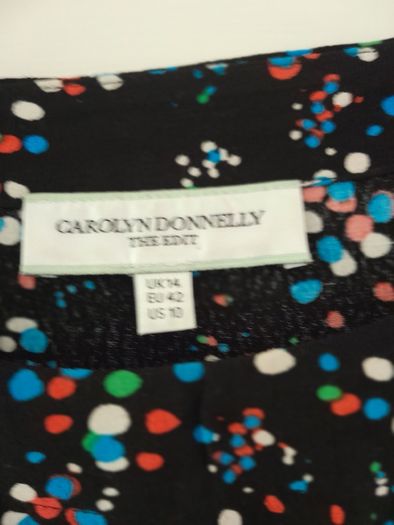 Caroline Donnelly Peplum  Top