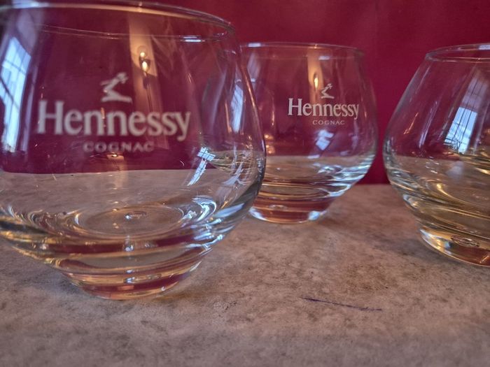 A Set of 4 Hennessy Cognac Glasses Branded with the Hennessy Cognac Logo