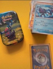 Pokemon TCG Bulk with 5 Rare Holo/Reverse Holo + 1 EX Card and including Tin!