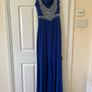 Debs dress for sale. Royal blue debs dress. Size 6 but would fit UK size 8. Freshly dry cleaned. Some loose thread on the back but otherwise in good condition. Image 2