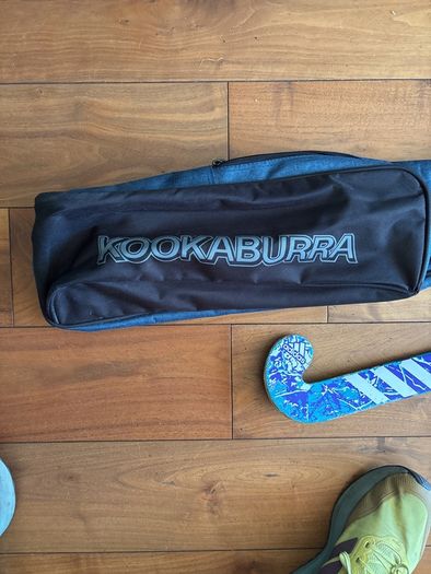hockey stick and bag
