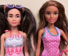 2 Barbie Dolls