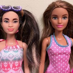 2 Barbie Dolls