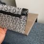 Guess purse. Never used but slightly worn due to storage. Image 6