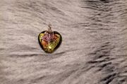 Multi colored heart pendant with wire wrap