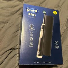 Oral b pro 1 braun electric toothbrush with travel case