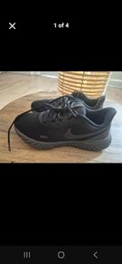 unisex black nike trainers