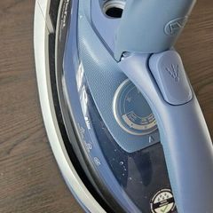 Teal steam iron