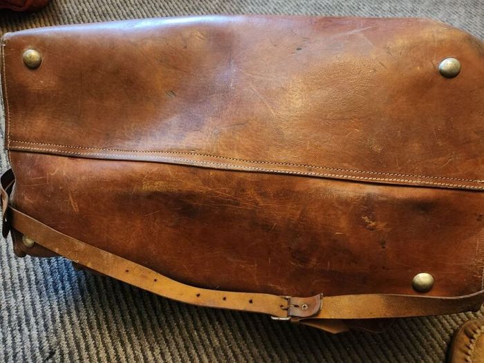 Large heavy duty leather bags plus briefcase.