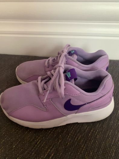 Purple Nike Tanjun Runners