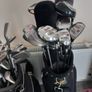 A selection of golf clubs and bags. Image 4