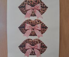 Leopard print lips with pink bows poster