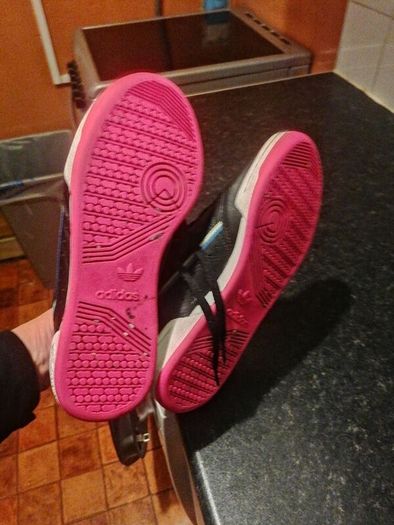 beautiful black leather Adidas runners