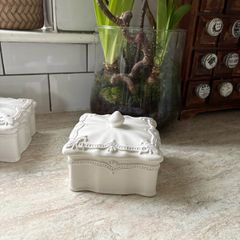 New French inspired ceramic lidded storage box in antique white.