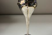 Vintage silver-plated bud vase featuring an Art Nouveau crocus and tulip design