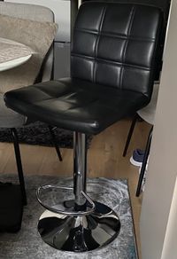 Black faux leather bar stool