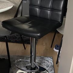Black faux leather bar stool