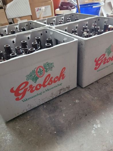 Grolsch beer brown glass bottles with porcelain swing caps.