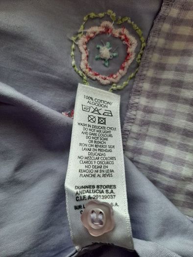 baby dress tag attached 100% cotton