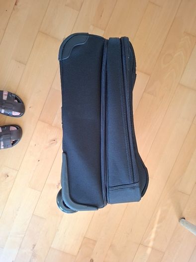 Delsey wheelie suitcase.