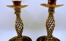 A pair of vintage spiral candle holders