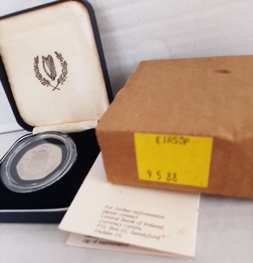 New 50p Millennium coin in original packaging