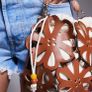River Island laser cut leather flower bag in brown Image 4