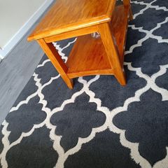 Dark grey Rug in great condition, Has been washed already and ready to go.
