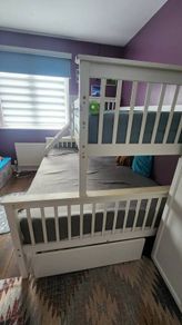 Triple bunk bed with mattresses
