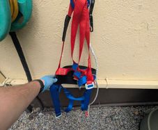 Fall arrest harness