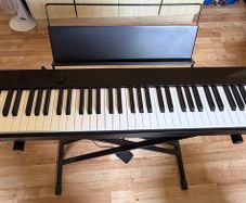 Casio px-s1100 digital piano (Black) + keyboard stand + storage bag