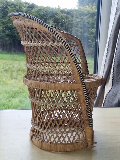 Vintage miniature wicker armchair in the "peacock" style