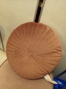 Stitched blush pink cushion