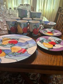 Colourful hand made pottery mugs set