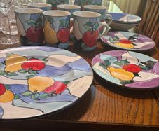 Colourful hand made pottery mugs set