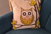 owl feather cushion