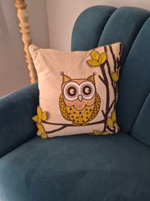 owl feather cushion