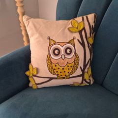 owl feather cushion