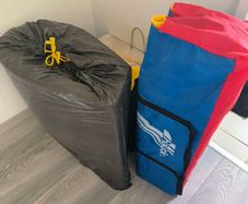 Free travel cot and spare nappies