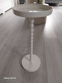 cream metal occasional table near 2ft