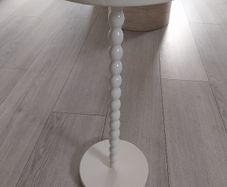 cream metal occasional table near 2ft