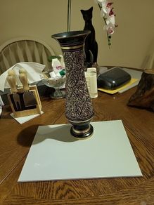 Vintage black and  gold vase