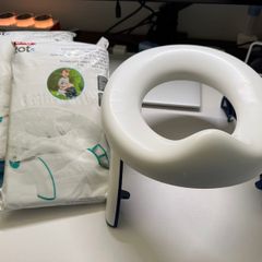 Oxo travel potty potty training foldable with 100 disposable bags