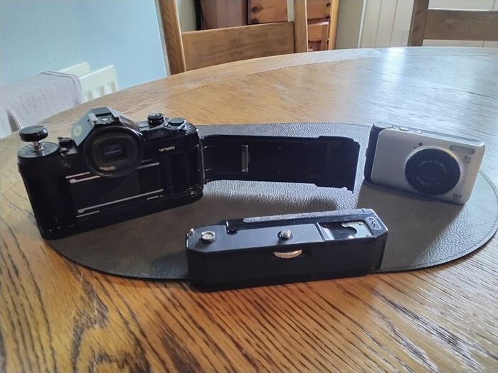 canon A-1 with 50mm lens & winder, also canon power shot A3000 both for spairs/ repair