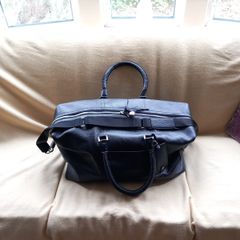 Kenneth Cole Large Black Leather holdall With Habdles And Shoulder Strap. and