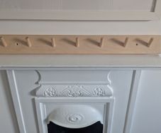 Peg rail coat rack