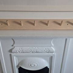 Peg rail coat rack