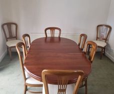Cherry wood dining table and 8 chairs